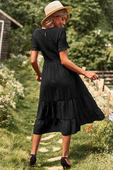 Robe mi-longue à pois smockés, col rond et manches courtes